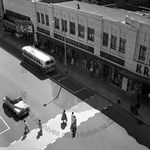 Overhead view of sidewalk in front of Kresge Department Store by Stanley Bauman